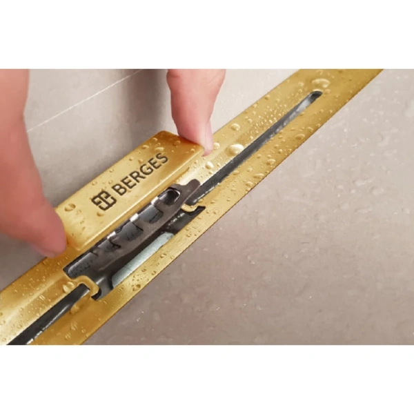 желоб berges водосток напольный simpel 1000 нержавеющая сталь, решетка золото глянец, s-сифон вертикальный